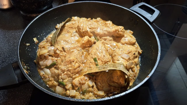chicken & marinade added to pan for pomegranate chicken curry chicken & marinade added to pan