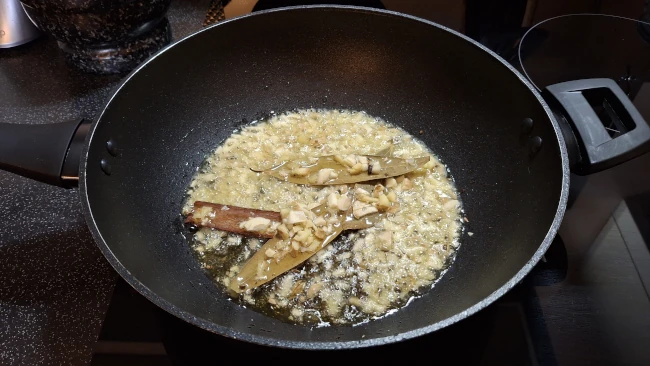 garlic & ginger frying with spices for pomegranate chicken curry garlic & ginger frying with spices