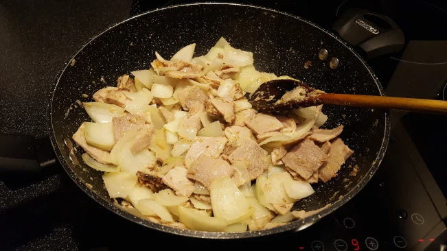 pork and onions frying