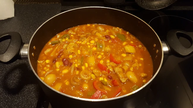 pork chilli cooked in a large pan pork chilli cooked