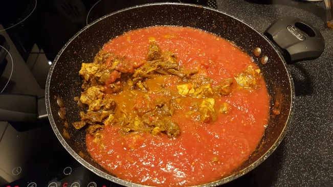 tomatoes added to pan