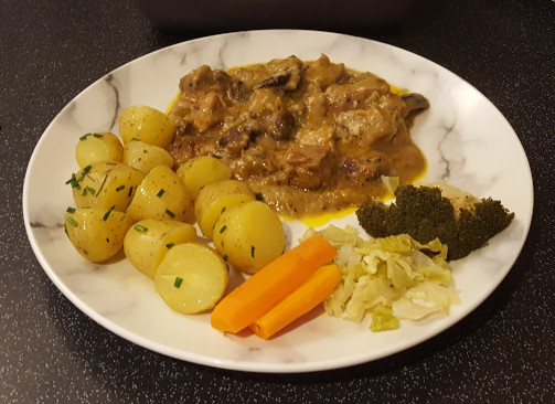 creamy pork served plated