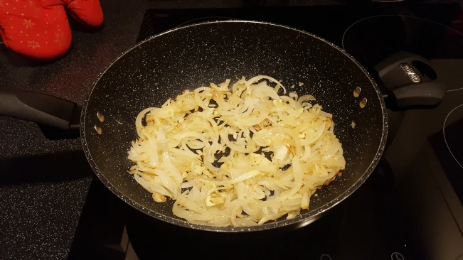 onions browning in a wok onions browning
