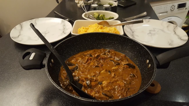 roast pork stroganoff served at a table pork stroganoff served