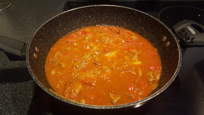 stock and tomatoes added