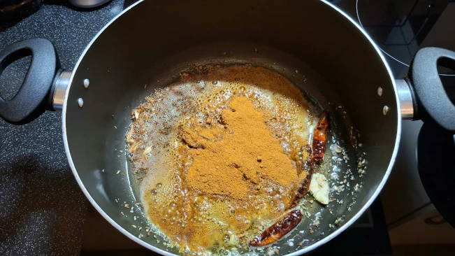 sambar masala added to Sambar spice base sambar masala added