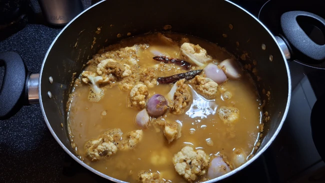 water added to stirred sambar water added to stirred sambar