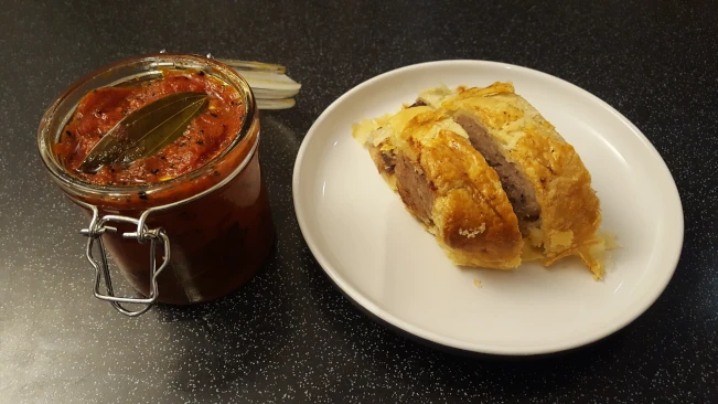 sausage roll slices and chutney
