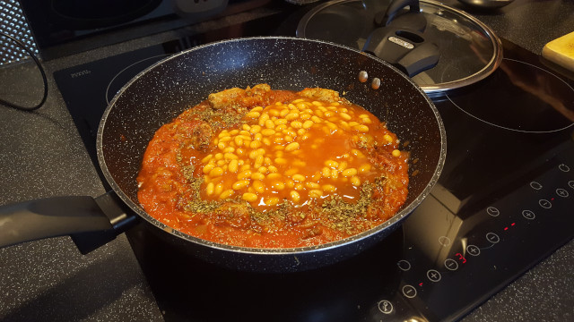 add baked beans to pan