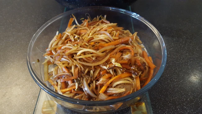 beansprout topping in a glass dish