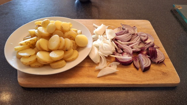 sliced onions and potatoes for spicy balti potatoes sliced onions and potatoes