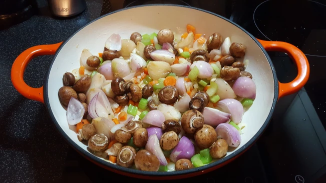 mushrooms added to pan of veg