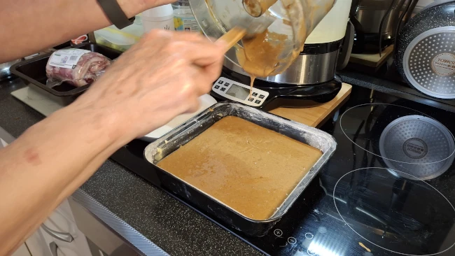 cake mix pouring into tray